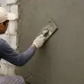如何计算墙面抹灰所需的水泥和沙子用量